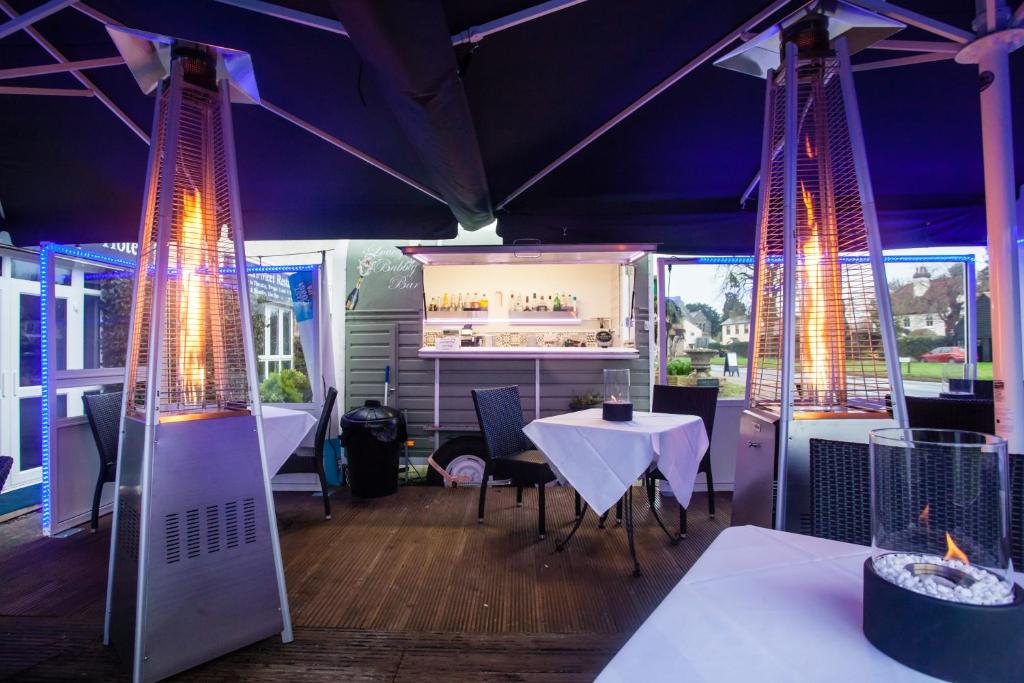 A restaurant or other place to eat at Hunters Meet 