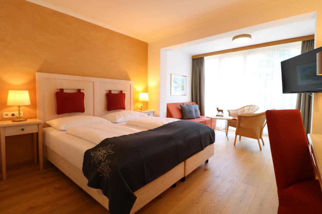 Postel nebo postele na pokoji v ubytování Hotel Bräu