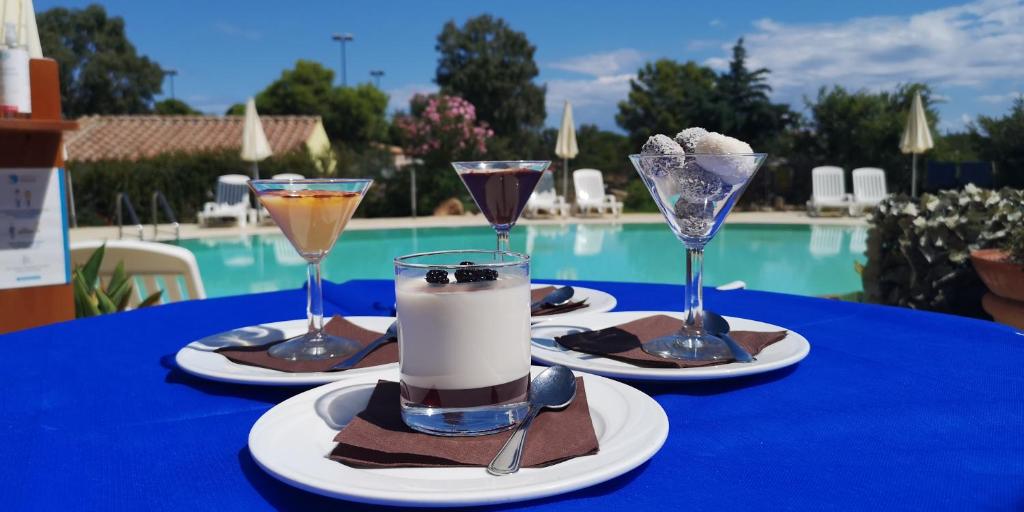 Bazén v ubytování Hotel Cala Mirto nebo v jeho okolí