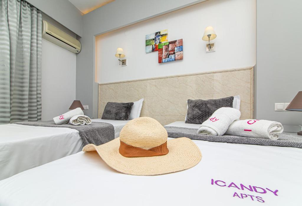 Postel nebo postele na pokoji v ubytování ICandy Sol