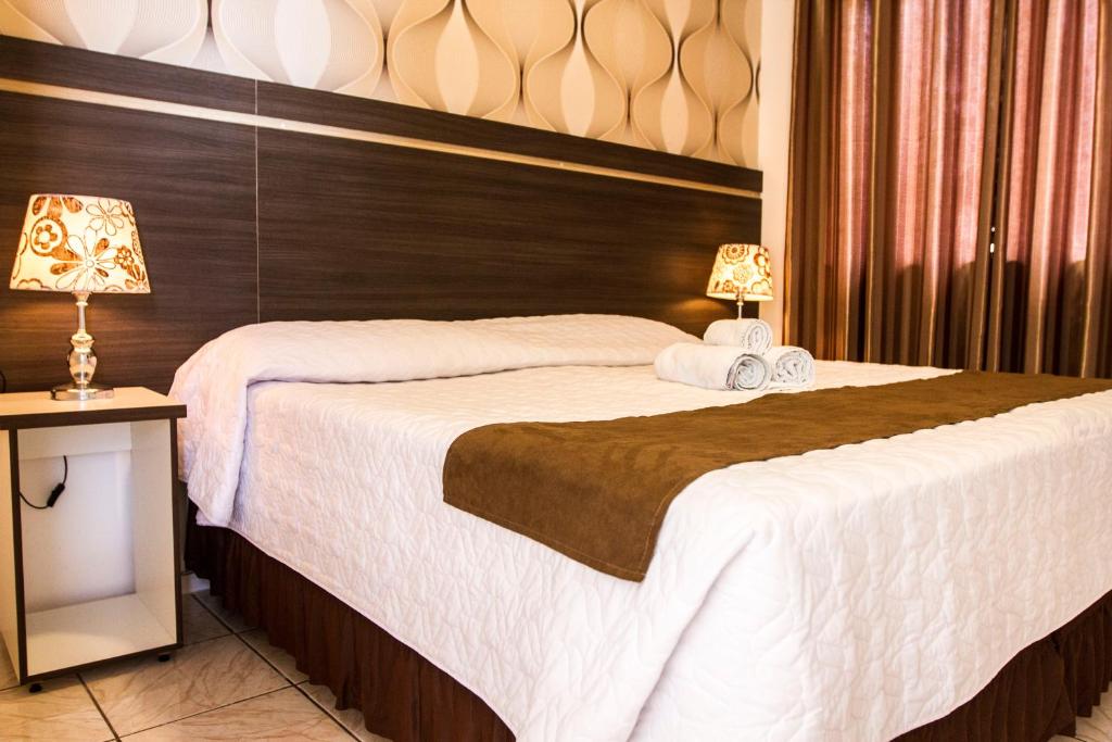 Postel nebo postele na pokoji v ubytování Hotel Vivere Cataratas
