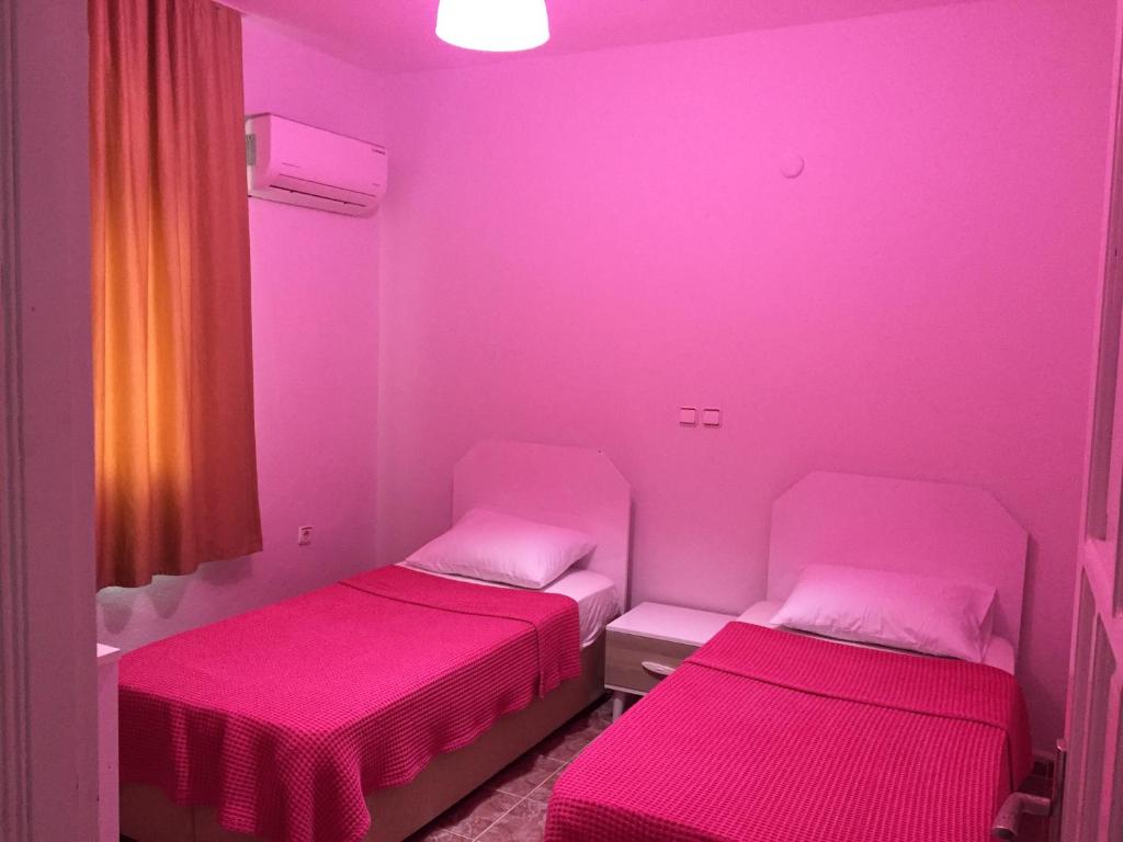 Postel nebo postele na pokoji v ubytování Şato Apart Hotel