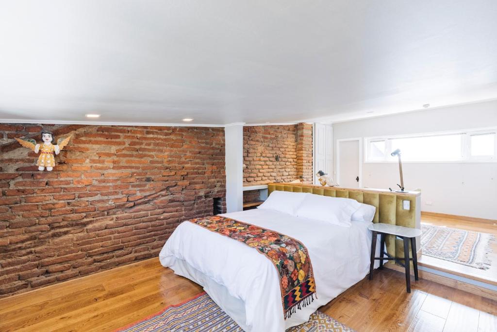 Postel nebo postele na pokoji v ubytování Casablu Hotel