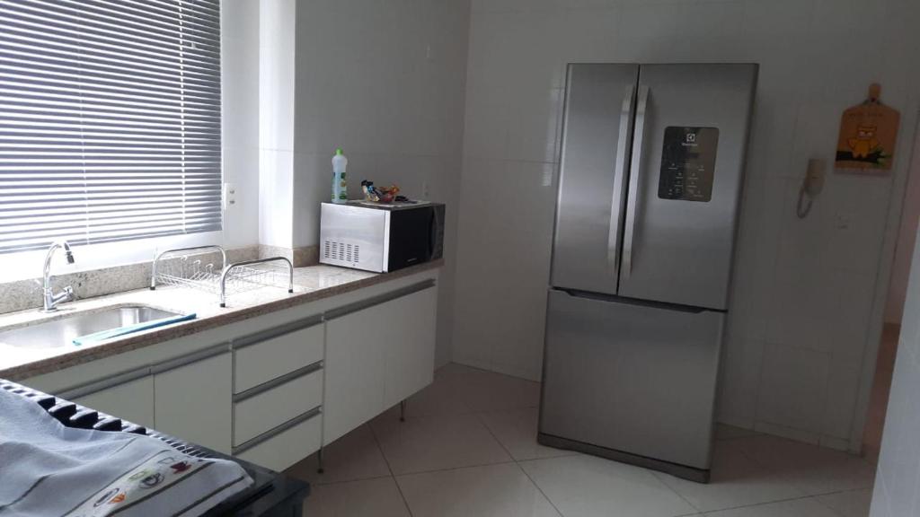  Cobertura Duplex com Hidromassagem ao ar livre para 8 pessoas.