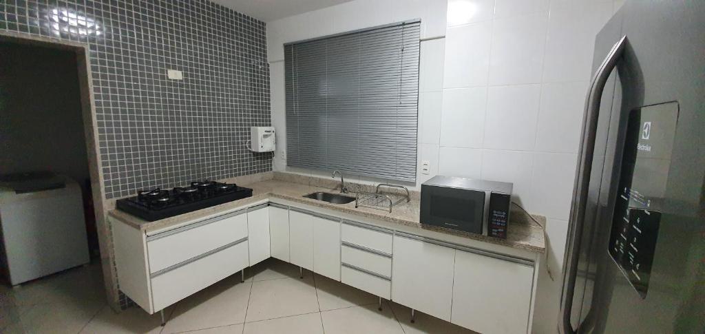 Cobertura Duplex com Hidromassagem ao ar livre para 8 pessoas.