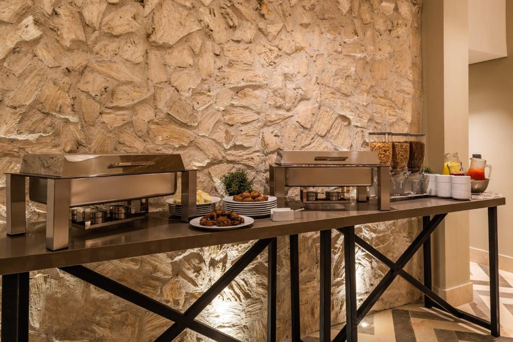 Kuchyň nebo kuchyňský kout v ubytování Oz Hotel Luxury