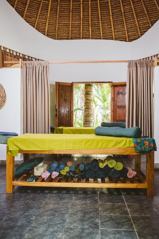 Voodi või voodid majutusasutuse Mana Eco Retreat toas