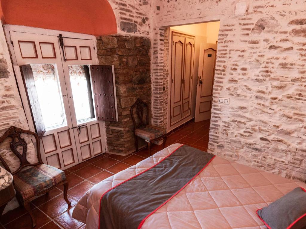 Cama o camas de una habitación en Hotel Las Palmeras by Vivere Stays
