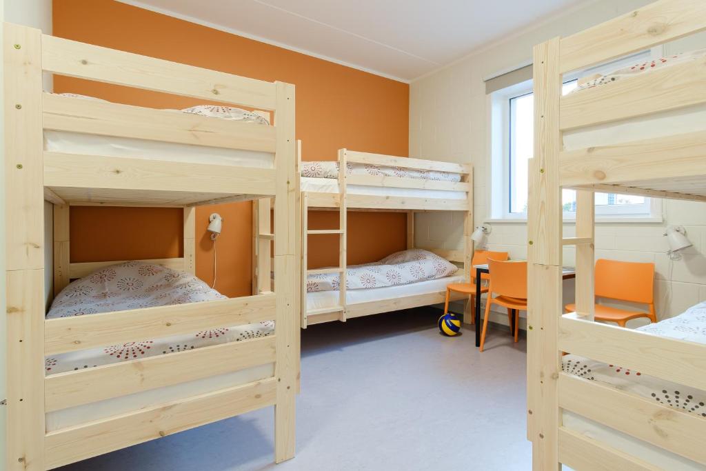 Postel nebo postele na pokoji v ubytování Märjamaa spordihoone