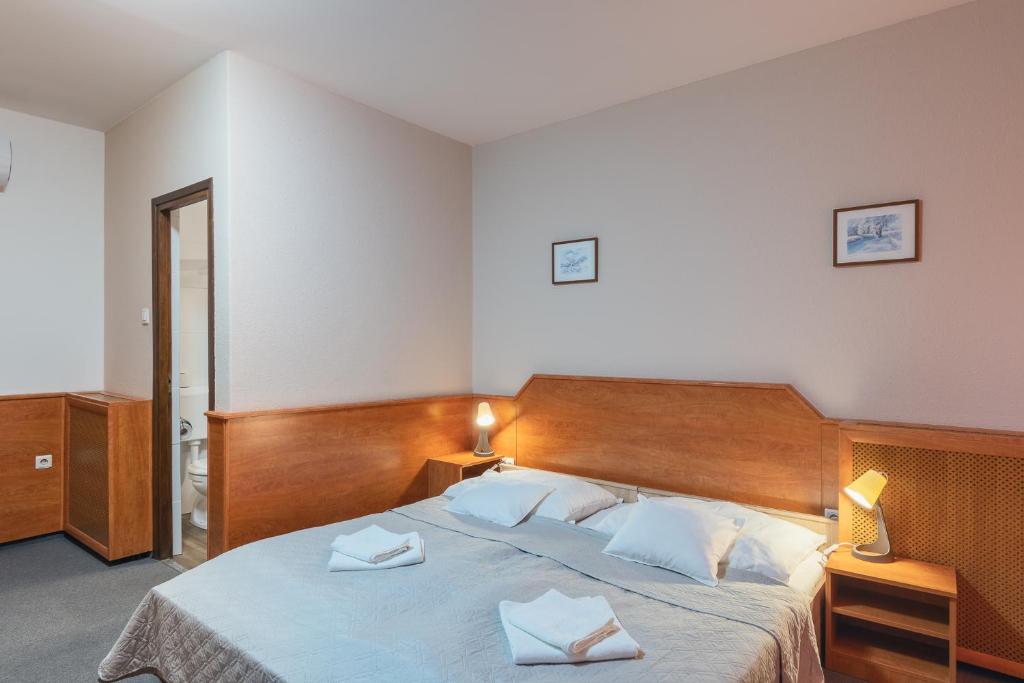 Cama o camas de una habitación en Delanta Panzio