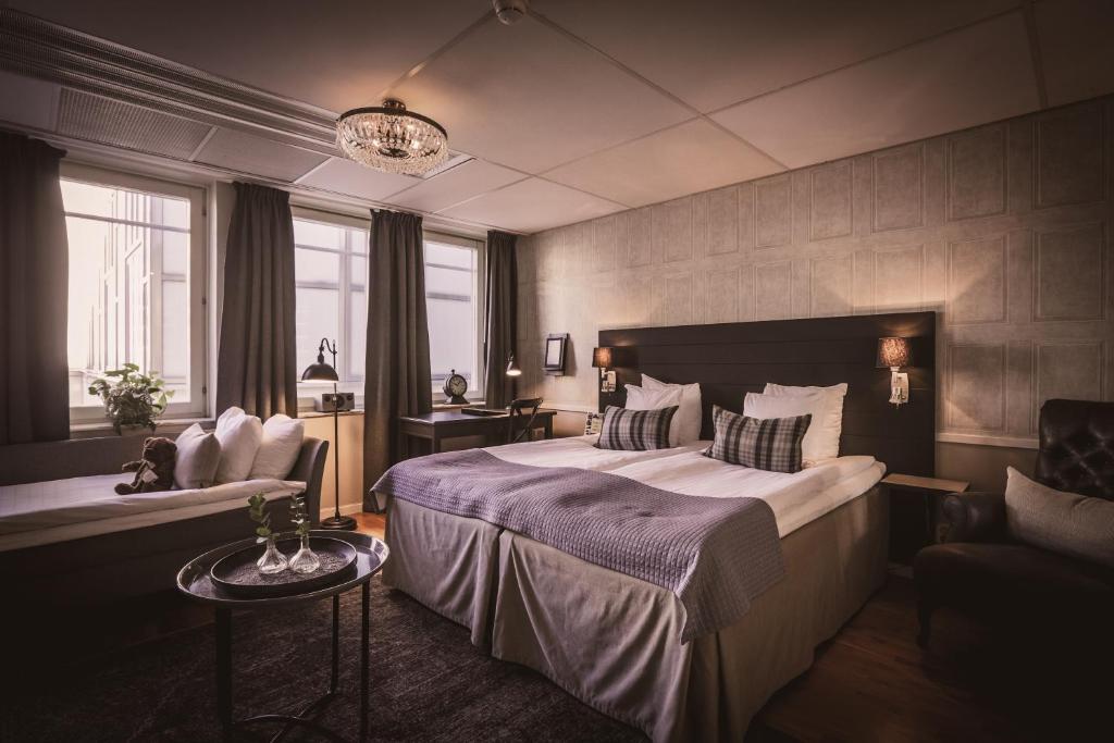 Postel nebo postele na pokoji v ubytování Freys Hotel