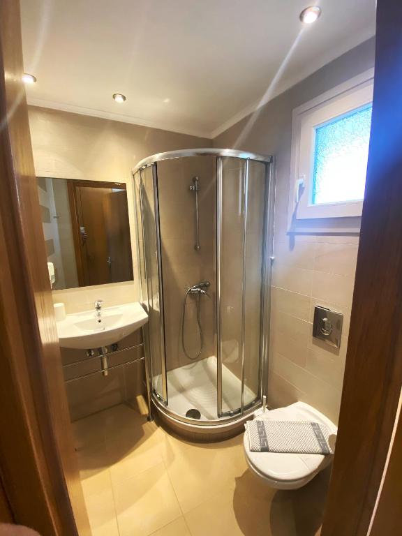 Koupelna v ubytování Cosmos Hotel