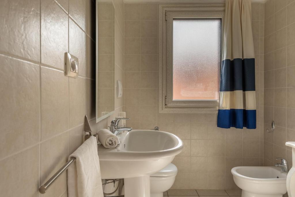 Ein Badezimmer in der Unterkunft Baia de Bahas Residence