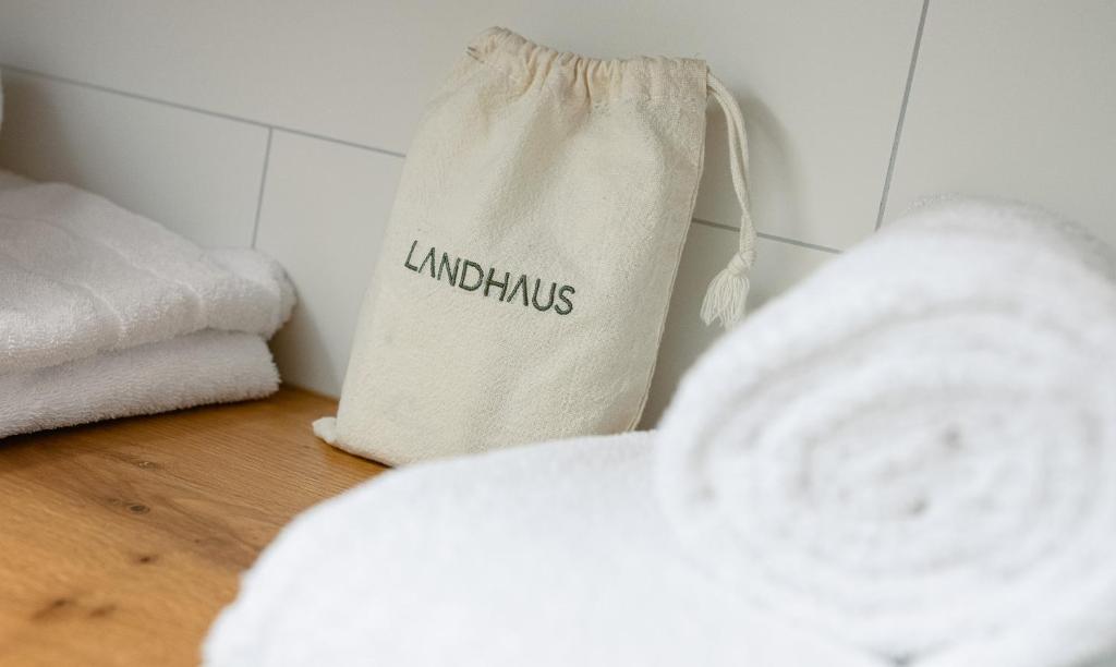 Postel nebo postele na pokoji v ubytování Hotel Landhaus