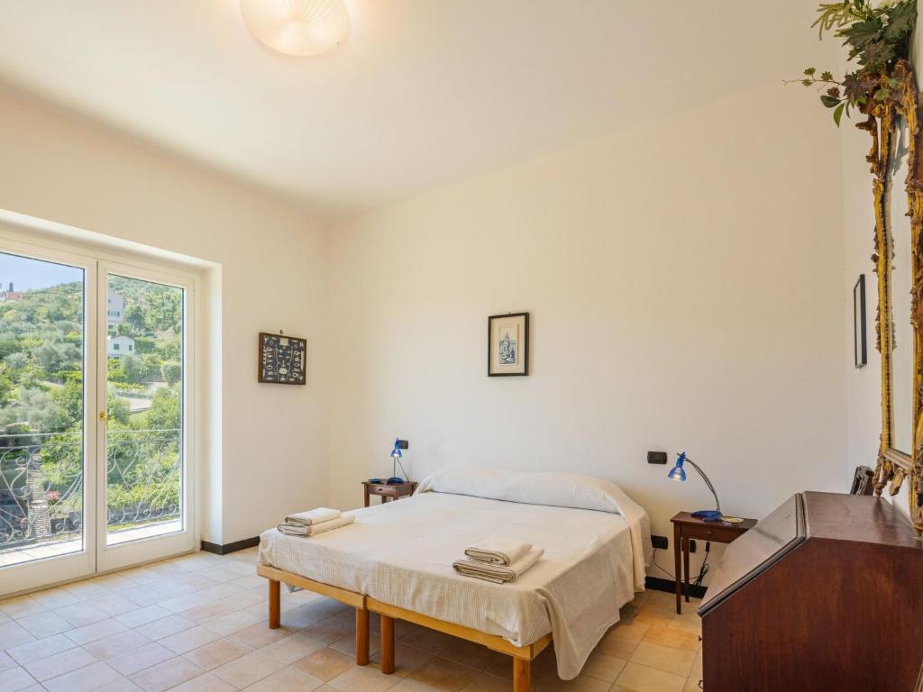 Łóżko lub łóżka w pokoju w obiekcie Villa Aldo by Interhome