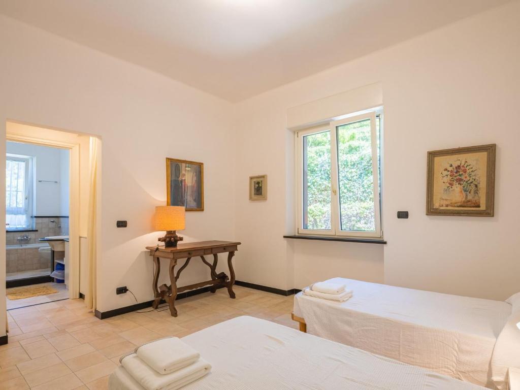 Łóżko lub łóżka w pokoju w obiekcie Villa Aldo by Interhome