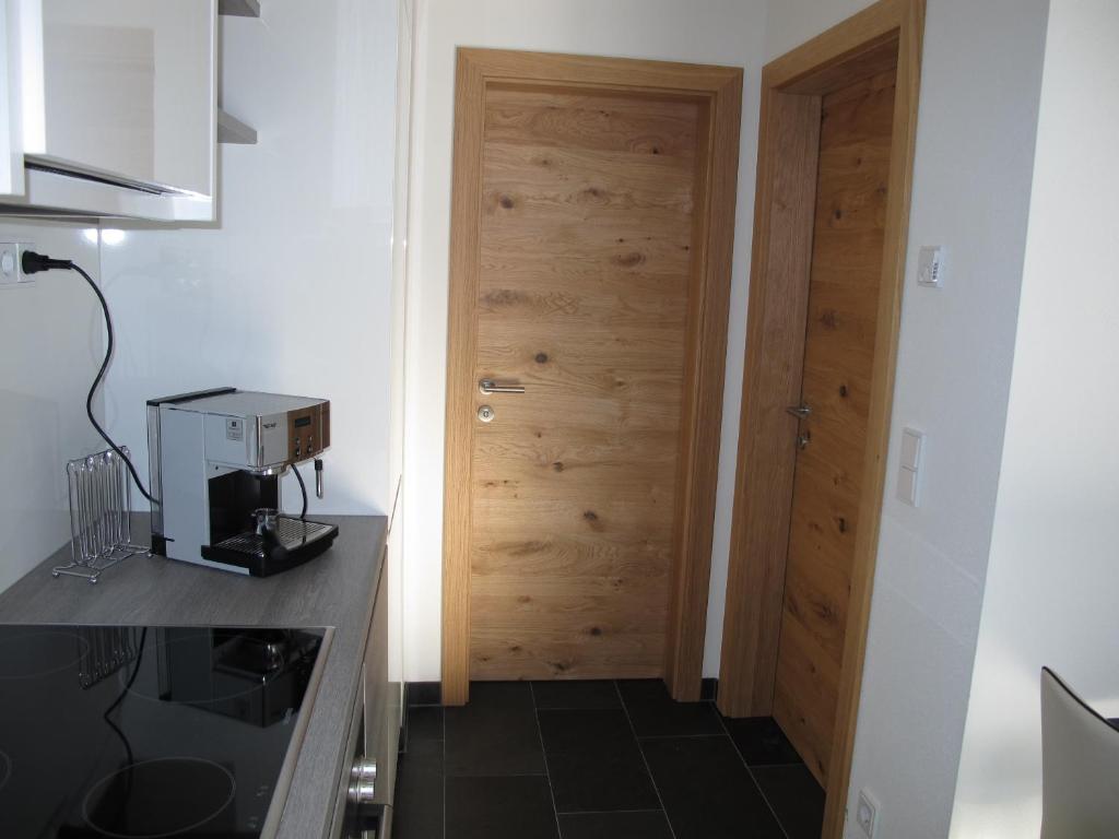 Kuchyň nebo kuchyňský kout v ubytování Haus Kibitz