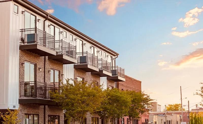 a brick building with balconies on the side of it at cowart in Chattanooga