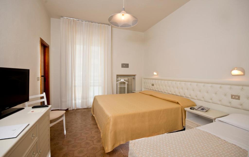 Кровать или кровати в номере Diplomatic