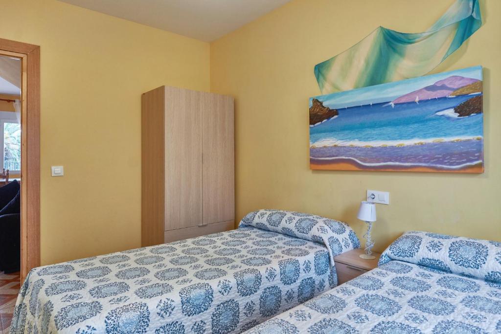 A bed or beds in a room at Spacious villa with pool in Porzuna - 90 m² and mountain view