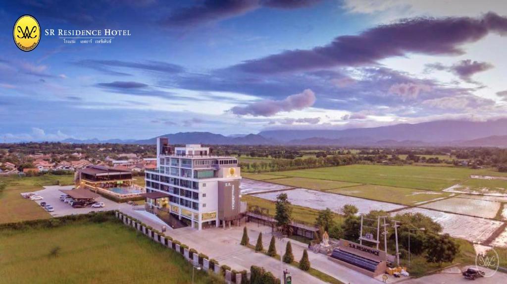 a rendering of a large building with trees in front at SR Residence Hotel in Phetchabun