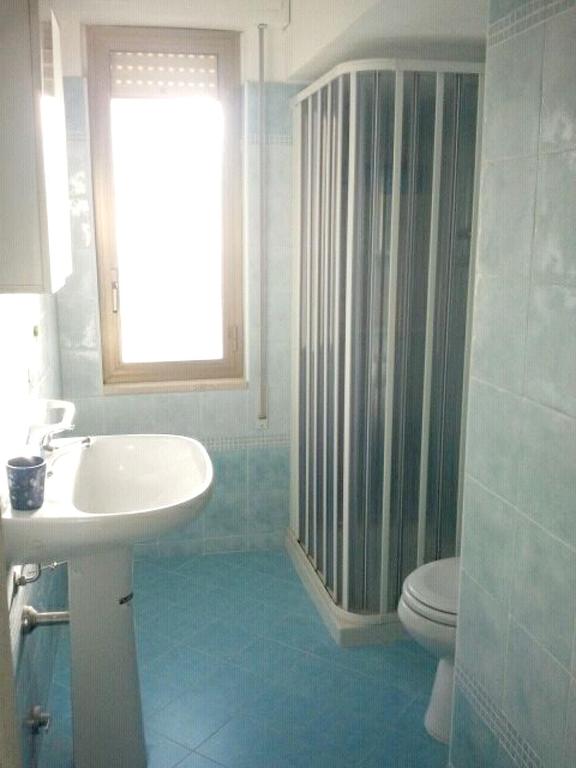A bathroom at Bright Apartment in Alcamo: 100 m² with Sea View
