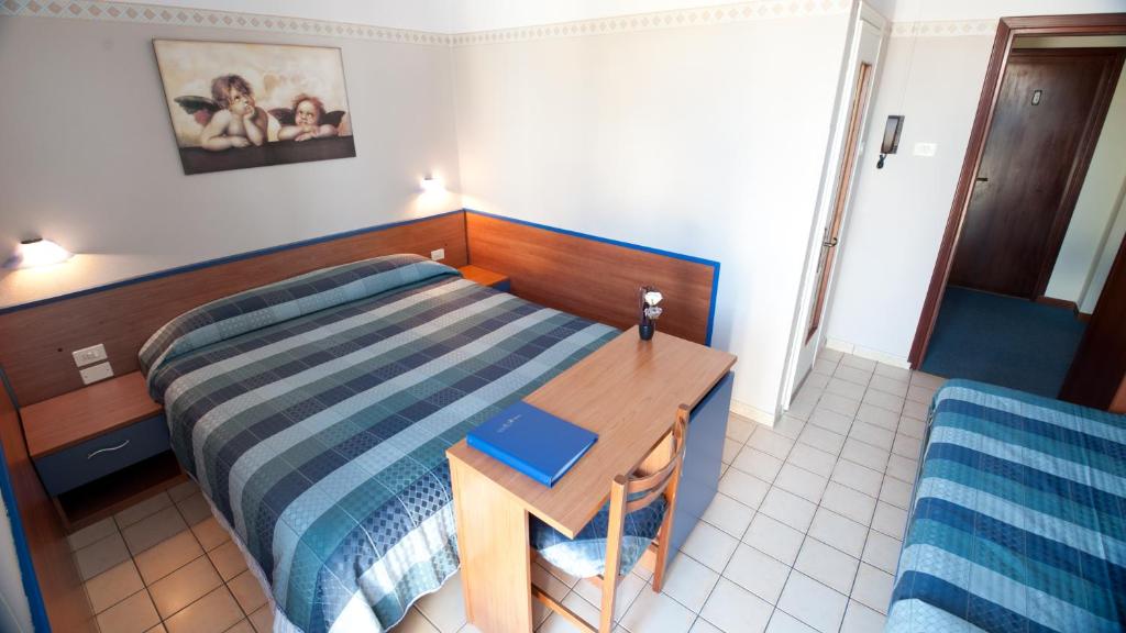 Albergo Marsariにあるベッド