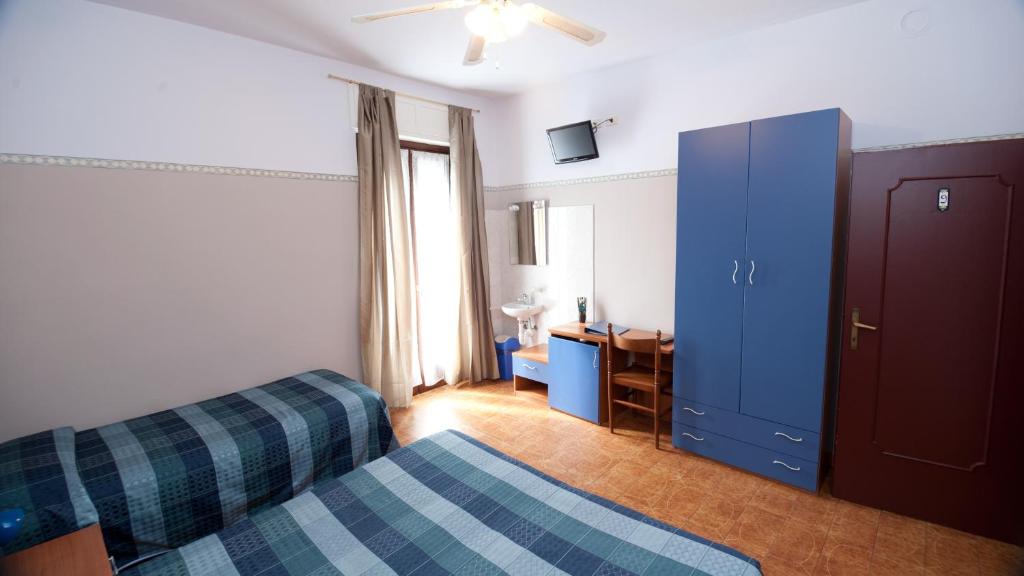 Albergo Marsariにあるベッド