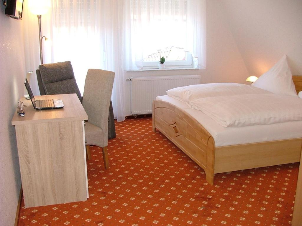 Postel nebo postele na pokoji v ubytování Hotel Thule