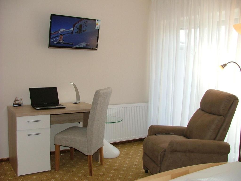 TV a/nebo společenská místnost v ubytování Hotel Thule