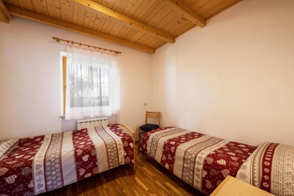 Posteľ alebo postele v izbe v ubytovaní Villa Mazzel with balcony
