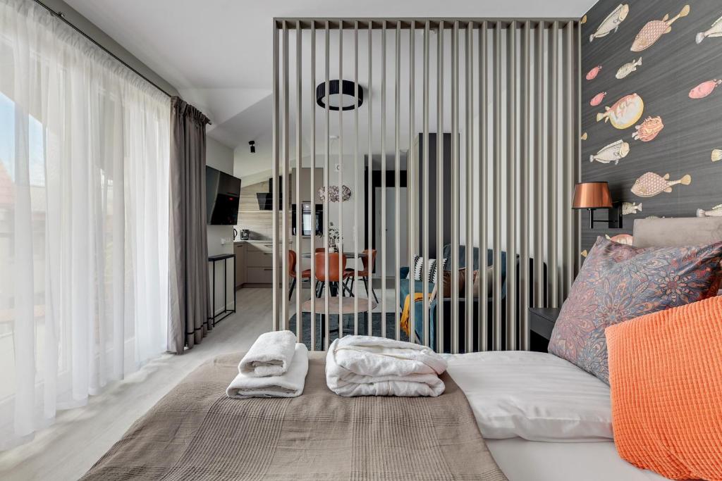 Posteľ alebo postele v izbe v ubytovaní Monte Carlo Luxury Suites with Parking by Lion Apartments Sopot