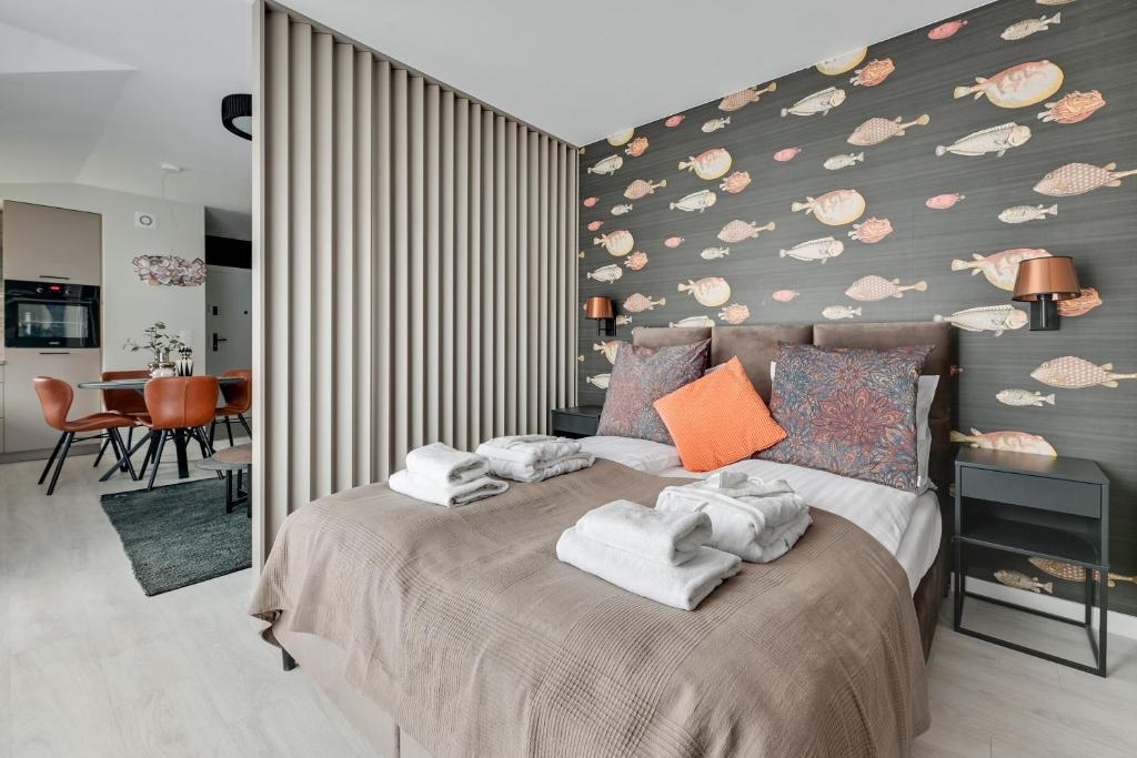 Posteľ alebo postele v izbe v ubytovaní Monte Carlo Luxury Suites with Parking by Lion Apartments Sopot