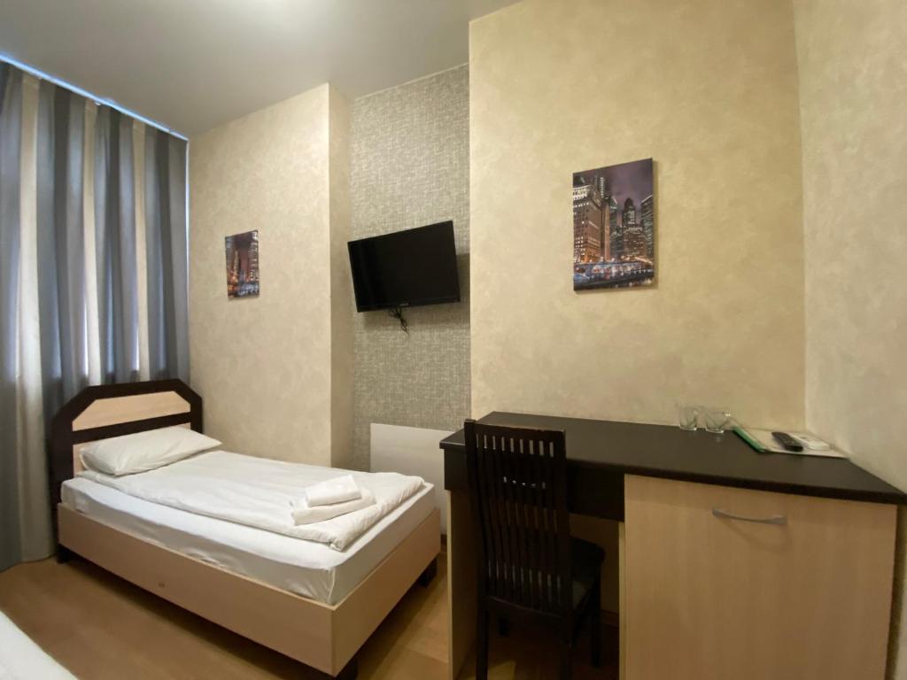 Postel nebo postele na pokoji v ubytování irisHotels