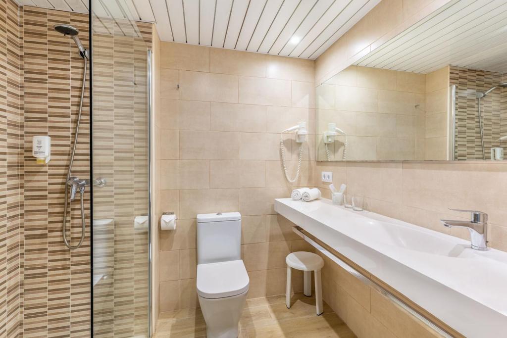 Um banheiro em Hotel Samos