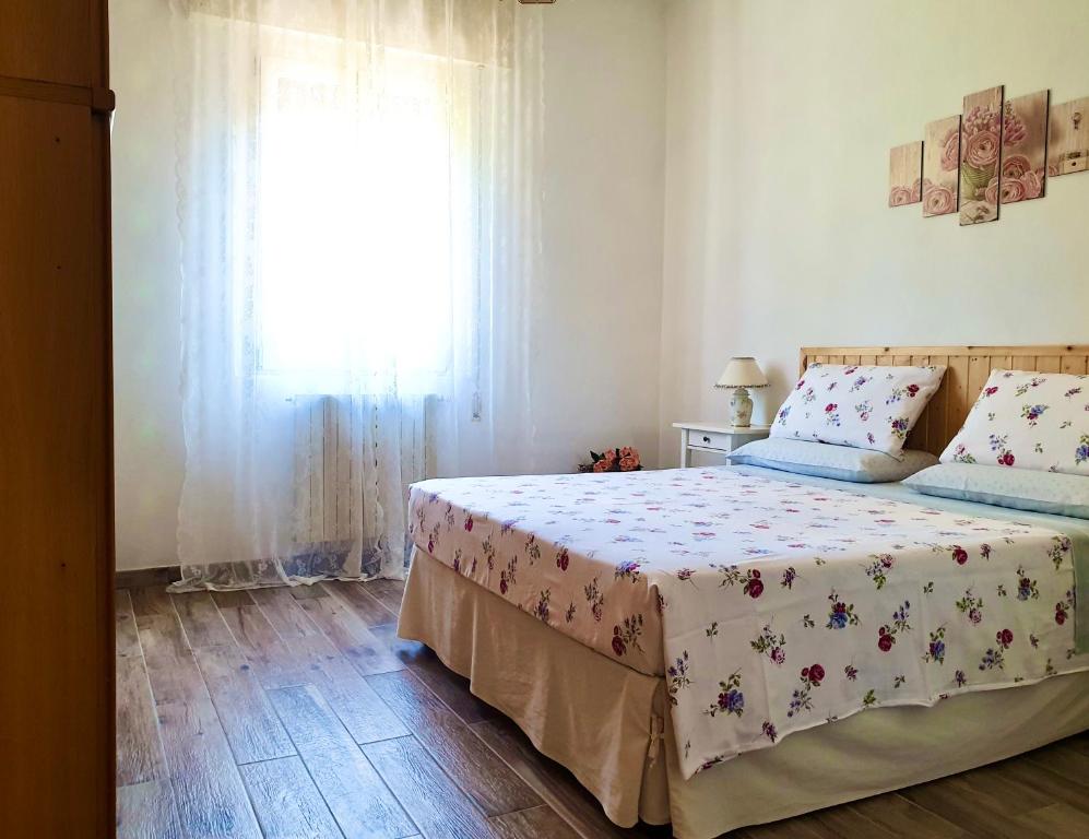 A bed or beds in a room at A Casa Di Clementina