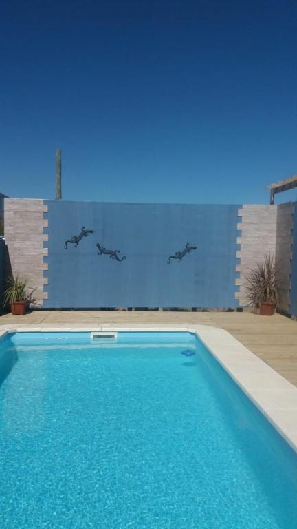 Bazén v ubytování Aroma de mar casas en alquiler vacacional con hermosa piscina nebo v jeho okolí