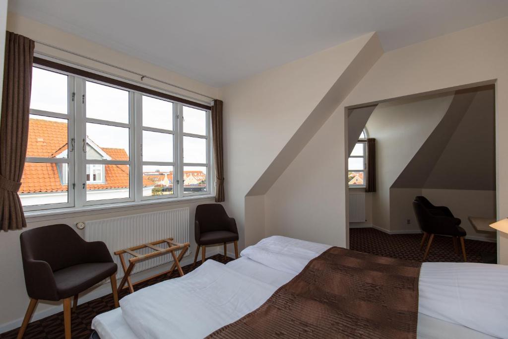 Posteľ alebo postele v izbe v ubytovaní Foldens Hotel