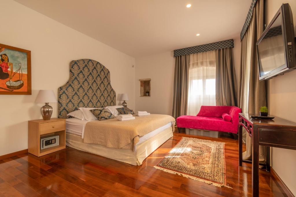 Posteľ alebo postele v izbe v ubytovaní B&B Heritage Villa Apolon