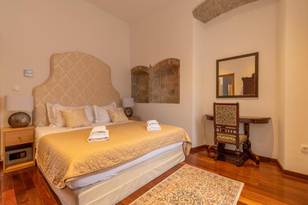 Posteľ alebo postele v izbe v ubytovaní B&B Heritage Villa Apolon