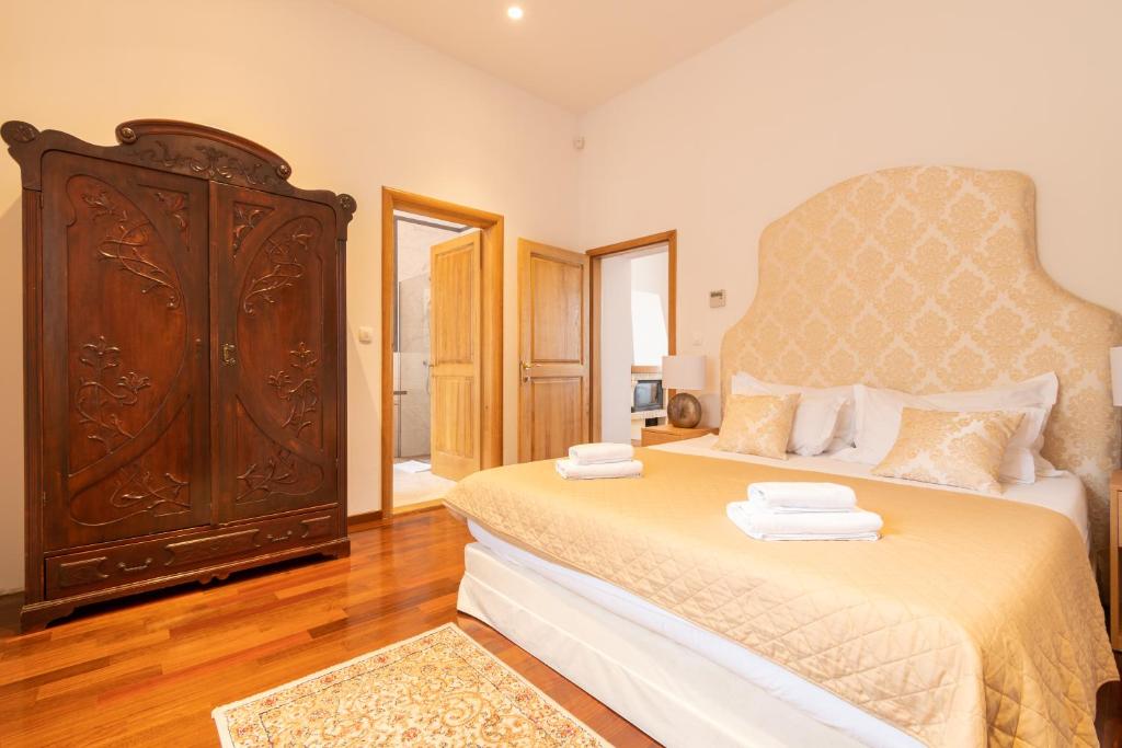 Posteľ alebo postele v izbe v ubytovaní B&B Heritage Villa Apolon