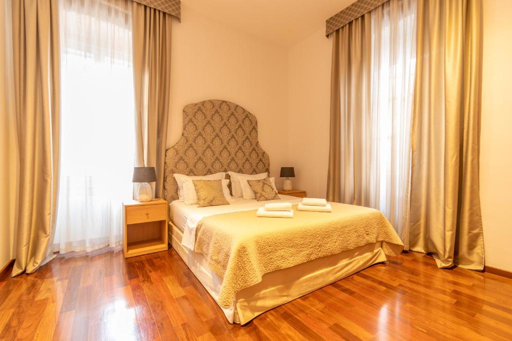 Posteľ alebo postele v izbe v ubytovaní B&B Heritage Villa Apolon