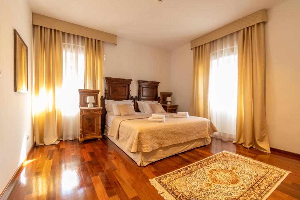 Posteľ alebo postele v izbe v ubytovaní B&B Heritage Villa Apolon