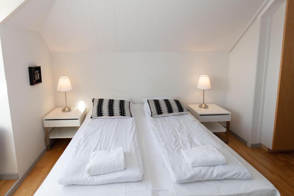Postel nebo postele na pokoji v ubytování Skagen Hotel Annex