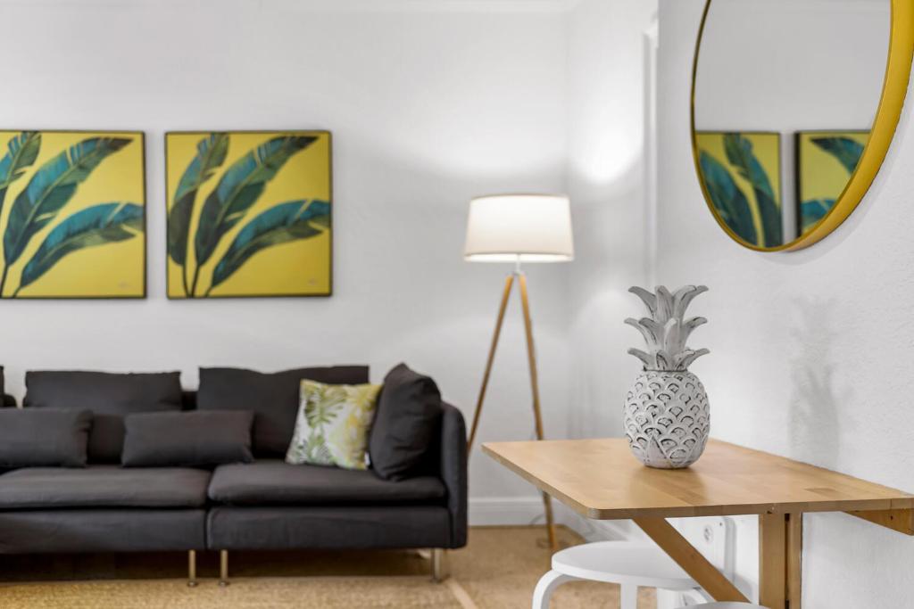 a living room with a couch and a table at Alani Bay Villas in Fort Lauderdale