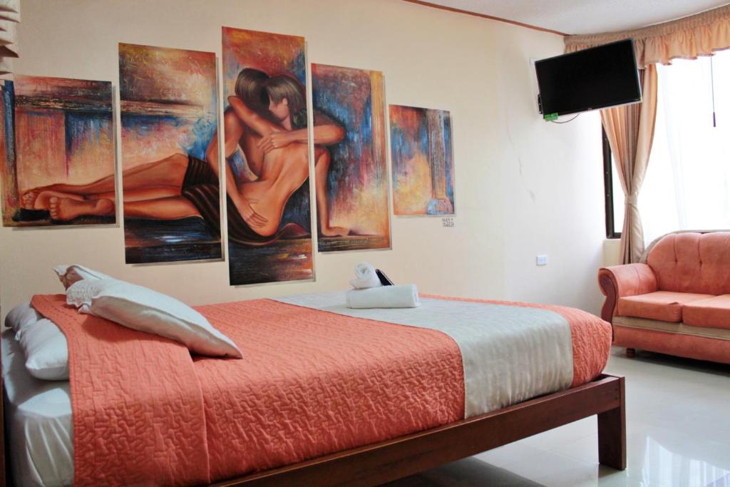 Postel nebo postele na pokoji v ubytování Hostal Dulce Amanecer