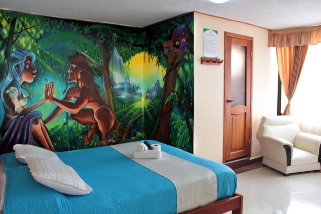 Postel nebo postele na pokoji v ubytování Hostal Dulce Amanecer
