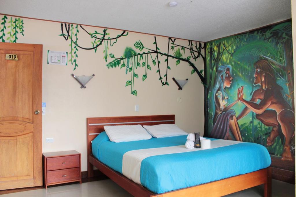 Postel nebo postele na pokoji v ubytování Hostal Dulce Amanecer