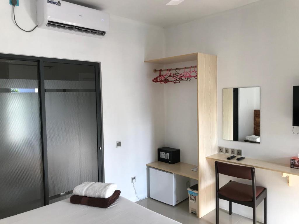 TV a/nebo společenská místnost v ubytování Royal Stay Inn