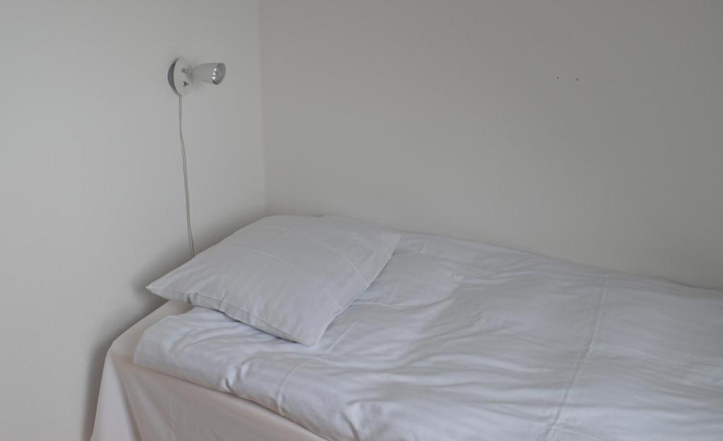 Postel nebo postele na pokoji v ubytování Samsø Perlen